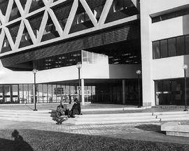 Photograph of Students Sitting Outside of Building E at North Campus