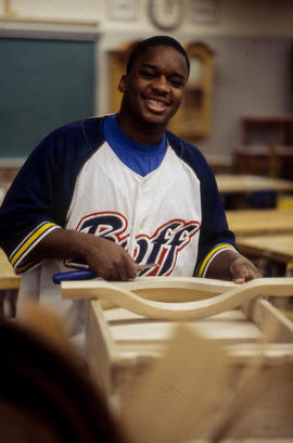 Photograph of student working in the woodworking lab