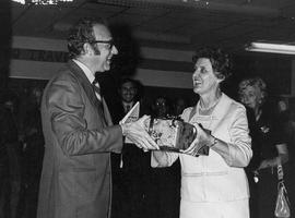 Photograph of Kay Hilton Presenting Doug Light with a Farewell Gift