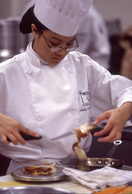 Photograph of Culinary student Linda at work in the lab