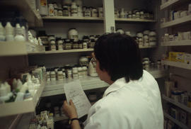 Photograph of a Pharmacy Assistant student at work