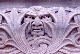 Photograph of a face carved into stone