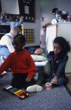 Photograph of two children playing at the daycare centre