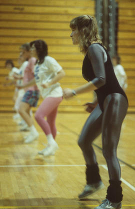 Photograph of a group of people in an aerobics class