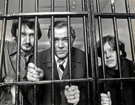 Photograph of Jack Ross and students Standing Behind Bars During their Visit to the Warworth Inst...