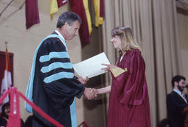 Photograph of a Student Receiving Her Certificate at Convocation