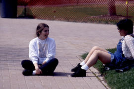 Photograph of two students enjoying a chat with each other