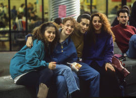 Photograph of students in the student cafeteria posing for the camera