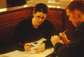 Photograph of students working on assignments