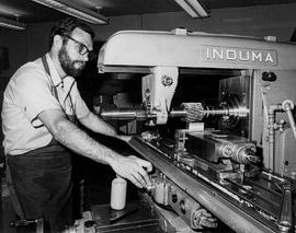 Photograph of a Student Operating an Industrial Equipment