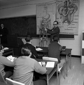 Photograph of an instructor teaching Anatomy in class