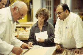 A photograph of Cabinet Making and Woodworking students in class