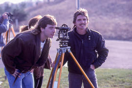 Photograph of Civil Engineering students using survey equipment
