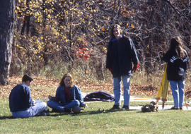 Photograph of Civil Engineering students using surveying equipment
