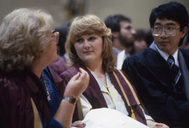 Photograph of graduating students seated in audience