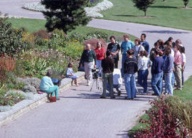 Photograph of faculty member Bert Hoferichter and students outdoors