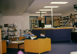 Photograph of Students Sitting Near the Circulation Desk in the Library