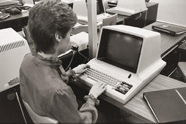 Photograph of word processing operator using the machine