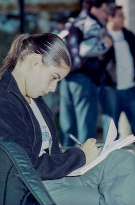 Photograph of a student working on an assignment