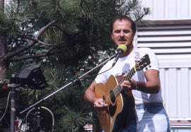 Photograph of a guitarist playing music