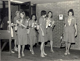 Photograph of Uniformed Women Exiting the Osler Campus Building