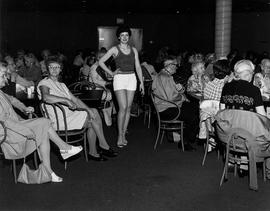 Photograph of a Young Woman Participating in the Fashion Show for a Group of Seniors