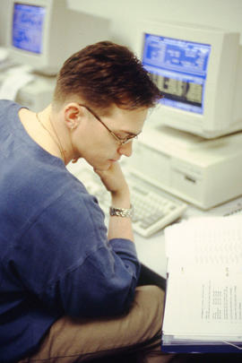 Photograph of a student working on an assignment at the computer