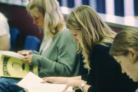 A photograph of Hospitality students reviewing notes