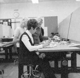 Photograph of Interior Design Students Developing Designs at the Drafting Tables