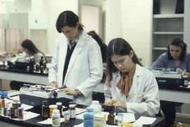 Photograph of Pharmacy Students Labeling and Filling Prescriptions