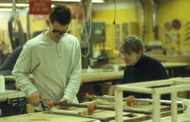 Photograph of a faculty member and student in the Cabinet Making / Woodworking program