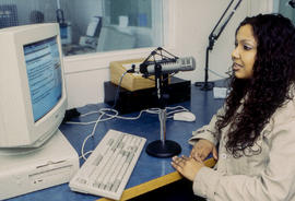 Photograph of student in Humber radio broadcasting studio