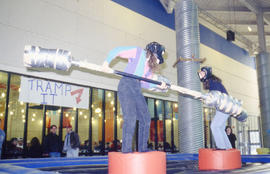 Photograph of two students during an event in the Student Centre