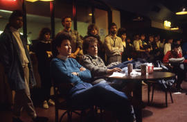 Photograph of students watching a performance