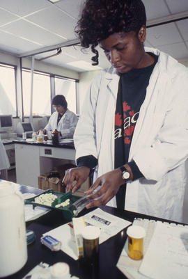 Photograph of a Pharmacy Assistant student at work