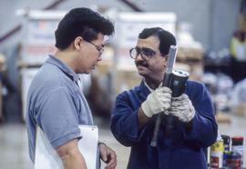 Photograph of an instructor explaining an equipment