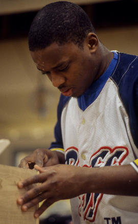 Photograph of a student working on a project in the woodworking lab