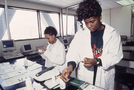 Photograph of a Pharmacy Assistant student at work