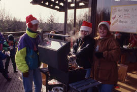 Photograph of People at the BBQ During the Christmas Tree Sale and Family Event