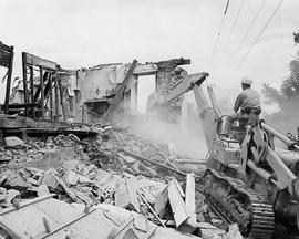 Photograph of the Historical Farm House Being Bulldozed