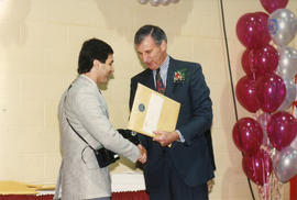 Photograph of Domenic Panacci receiving an award at the President's Breakfast