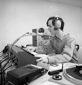 Photograph of a student operating the Humber radio station