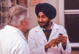 Photograph of a Gary Dunn and a student in the lab
