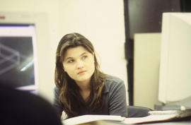 Photograph of a student at a lecture session