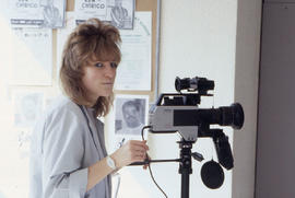 Photograph of a student using a video recorder
