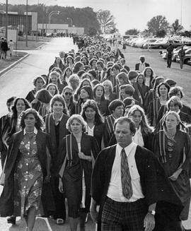 Photograph of George Evans Leading the Procession of Graduating Students