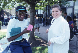 Photograph of a A SAC Rep Talking With a Student