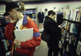 A photograph of students browsing through books in the Bookstore