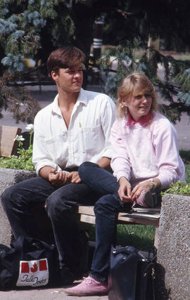 Photograph of two students seated on a bench
