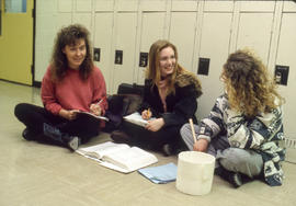 Photograph of hospitality students seated by the lockers